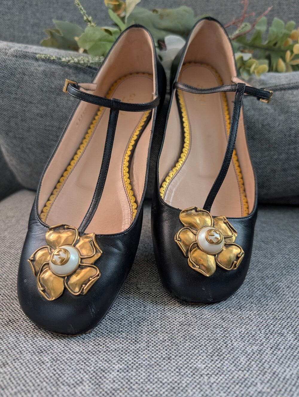 Gucci  T-Strap Flats with Gold Floral Medallions